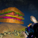 A screenshot of the big sandwich surrounded by grunts in a dark cave in the game.